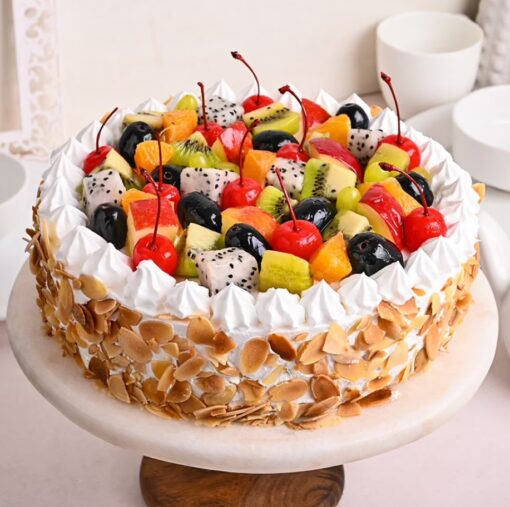 Fruity Almond Elegance Cake – layered cake with fresh fruit filling and almond accents.
