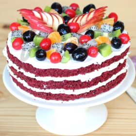 Fruity Velvet Red Delight – red velvet cake layered with fresh fruit filling and cream cheese frosting