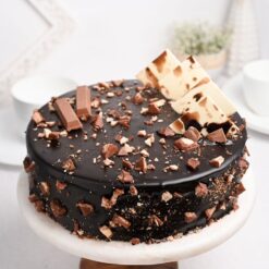 Kitkat Lover’s Delight Cake – chocolate cake layered with Kitkat bars and creamy frosting.