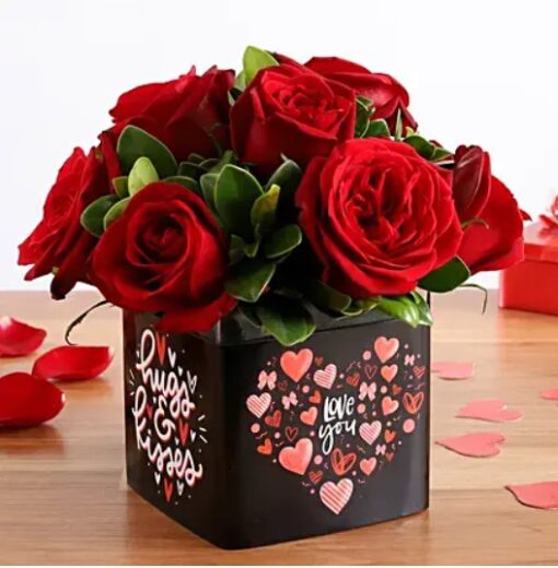 Radiant Red Roses Bouquet – 24 fresh red roses with green foliage arranged elegantly