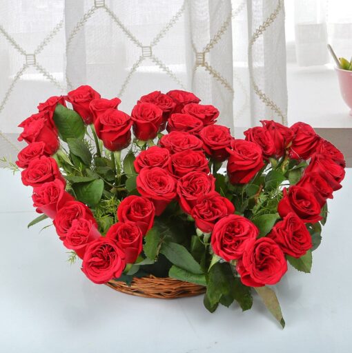 Twin Flame Floral Arrangement – paired bouquet of vibrant roses and elegant blooms.