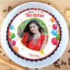 Half Moon Photo Cake – semi-circular cake with floral decor and personalized photo