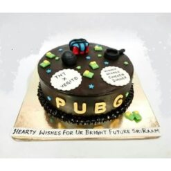 Ultimate Gaming Celebration Cake—custom gamer birthday cake with gaming-themed decorations.