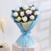 Elegant Snow Rose Bouquet showcasing a beautiful arrangement of pure white roses symbolizing purity and grace, ideal for weddings and special occasions.