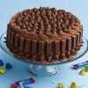 Crispy Kitkat Fantasy—chocolate cake topped with Kitkat bars and chocolate shavings.