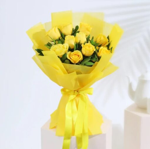 Bright Sunny Bloom Bouquet showcasing a vibrant arrangement of yellow and orange flowers symbolizing sunshine and joy, ideal for cheerful gifting.