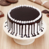 Chocolate vanilla cascade cake with swirled frosting and layered design.