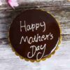 Mom’s Luxe Truffle Delight—luxurious chocolate truffle cake with elegant floral decoration for Mother’s Day.