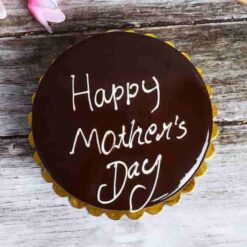 Mom’s Luxe Truffle Delight—luxurious chocolate truffle cake with elegant floral decoration for Mother’s Day.