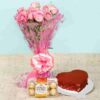 Red velvet cake decorated with Ferrero Rocher chocolates and elegant floral designs—Ferrero Red Velvet Elegance.