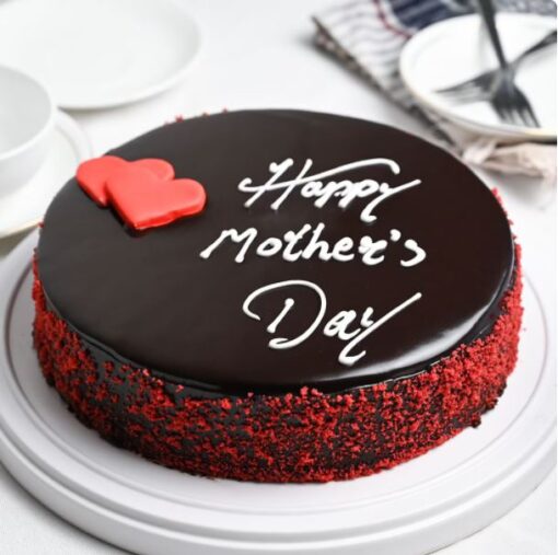 Velvety Mother's Day Red Velvet Cake with raspberry cream cheese filling and decorative frosting