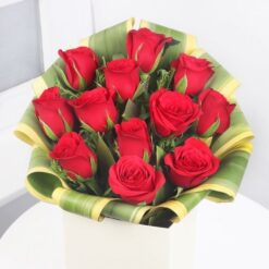 Mystical Love Roses bouquet featuring deep, shadowy red and purple roses arranged elegantly