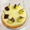 Butterscotch cake with chocolate stick topping and caramel crunch, ideal for dessert lovers and special celebrations.