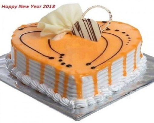 Butterscotch Romance Cake—heart-shaped butterscotch cake with silky cream and delicate floral accents.