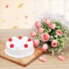 Pink Rose Vanilla Celebration bouquet with fresh pink roses and a vanilla flower cake beautifully presented together.