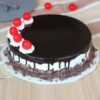Decadent Black Forest cake with cherries and chocolate layers.