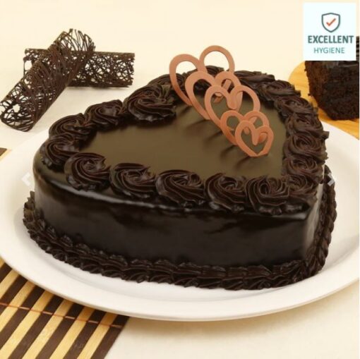 Smooth Chocolate Heart Cake – heart-shaped cake with silky chocolate frosting.