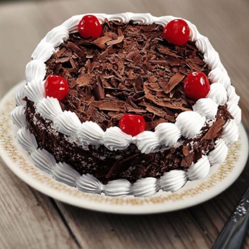 Classic Black Forest Gateau – chocolate cake with whipped cream and cherries