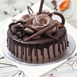 Luxe Rose Chocolate Cake—rich chocolate cake with edible rose decorations and elegant floral accents.