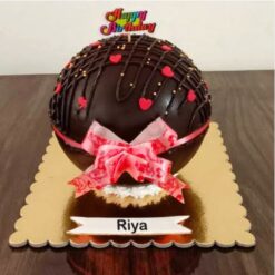 World Fiesta Pinata Cake – colorful layered cake with candy-filled surprise inside.