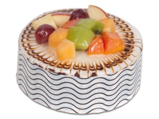 Vanilla Fruit Medley Cake with fresh strawberries, blueberries, raspberries, and creamy vanilla frosting.