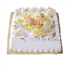 Pineapple Sensation Cake with moist pineapple layers, creamy pineapple whipped cream frosting, and tropical garnish