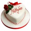 Artistic Heart Cake – heart-shaped cake with handcrafted floral decorations.