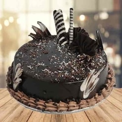 Silken Chocolate Indulgence—luxurious, velvety chocolate cake with elegant decoration.