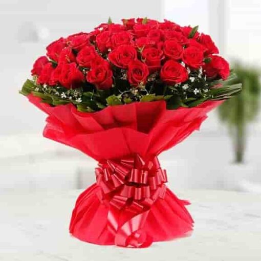 Elegant bouquet featuring a mix of charming roses in vibrant colors, beautifully arranged.