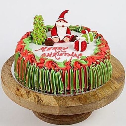 Jolly Santa Cake decorated with Santa Claus figure and Christmas-themed frosting.