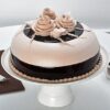 Floral Chocolate Elegance – chocolate cake decorated with edible flowers.
