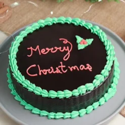 Indulge in a decadent Christmas Chocolate Cake—moist chocolate layers, festive decorations, and classic holiday flavors.