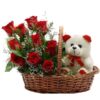 Teddy & Scarlet Rose Basket featuring red roses and a plush teddy bear in a decorative basket.