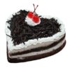 Heart-shaped Black Forest Love Cake with whipped cream and cherries.