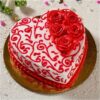 Elegant Valentine Heart Cake with floral decorations and smooth frosting.