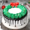 Christmas Black Forest Delight – chocolate cake with cherries and festive Christmas decorations