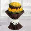 Sunny Yellow Rustic Wrap bouquet with bright yellow flowers in rustic brown kraft paper.