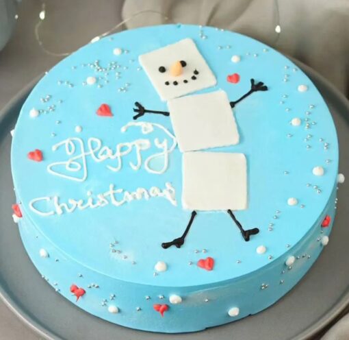 Frosty Blue Vanilla Cake with icy blue frosting and vanilla layers