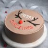 Christmas Chocolate Dream Cake with rich chocolate frosting and festive decorations