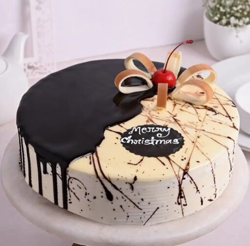 Vanilla Choco Bliss Cake with layered chocolate and vanilla frosting