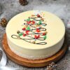 Vanilla Sparkle Christmas Cake with shimmering decorations and vanilla frosting