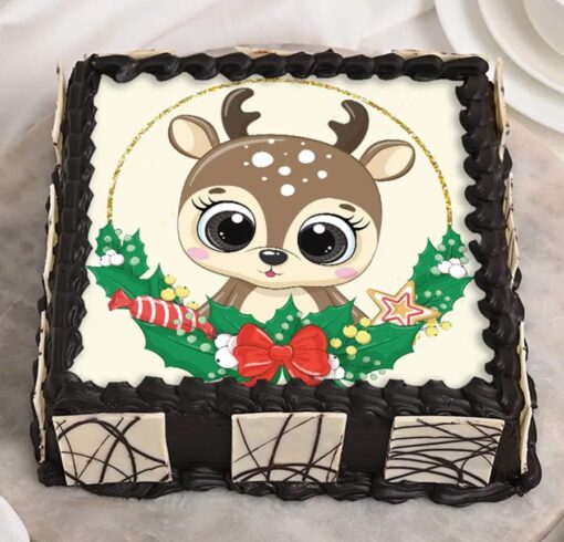 Reindeer Chocolate Holiday Cake with festive reindeer decoration