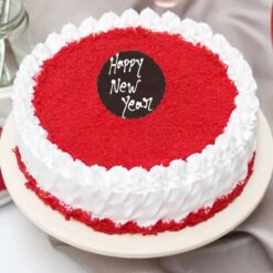 New Year Velvet Bliss cake with rich red velvet layers and creamy white frosting