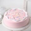 New Year Vanilla Charm cake with white frosting and elegant New Year decoration