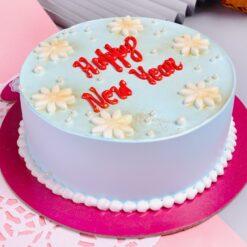 New Year Vanilla Delight cake with creamy vanilla layers and festive decoration