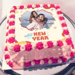 New Year Memory Cake with personalized photo design and festive decorations