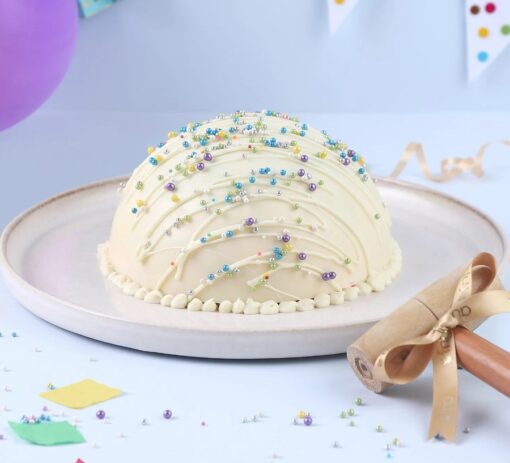 Festive Confetti Pinata Cake with colorful confetti and surprise center