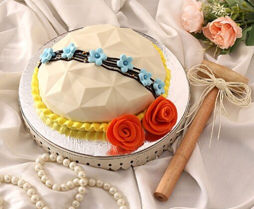 Floral Treasure Pinata Cake with colorful flowers and hidden pinata center
