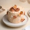 Beautiful Rose Kissed Flutter Cake decorated with delicate pink roses and edible butterflies, perfect for birthdays and romantic celebrations