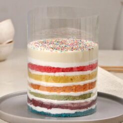 Rainbow Ganache Pull-Up Cake with colorful layers and chocolate ganache drizzle.